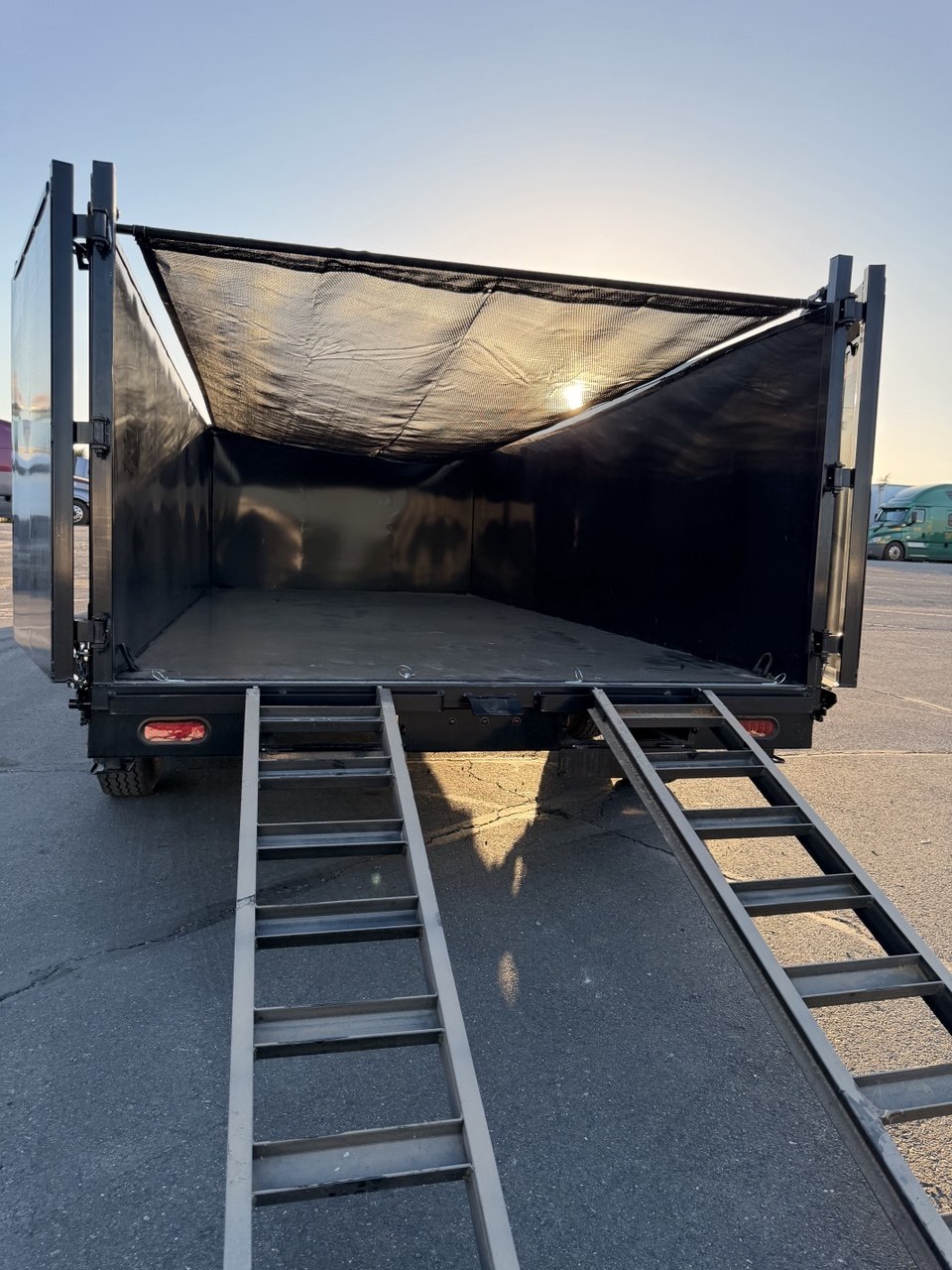 Truck bed loaded with removed junk