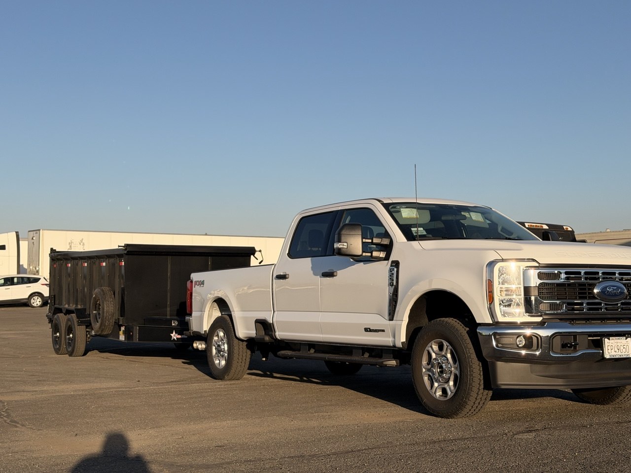 MZM Junk Removal Ford F-250 with dump trailer in Roseville, CA