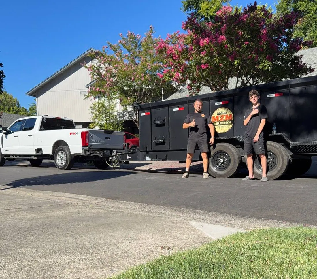 MZM Junk Removal crew with dump trailer in Roseville, CA