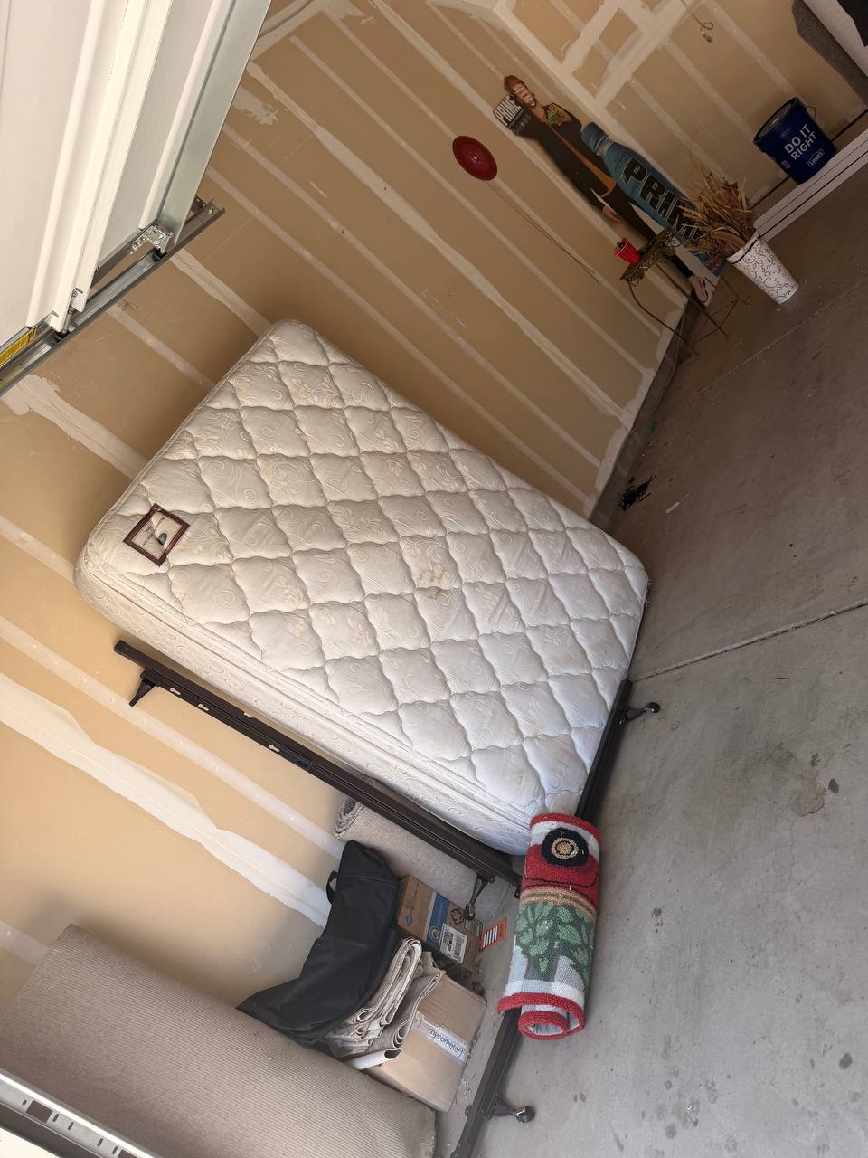 Old mattresses set out for MZM Junk Removal pickup