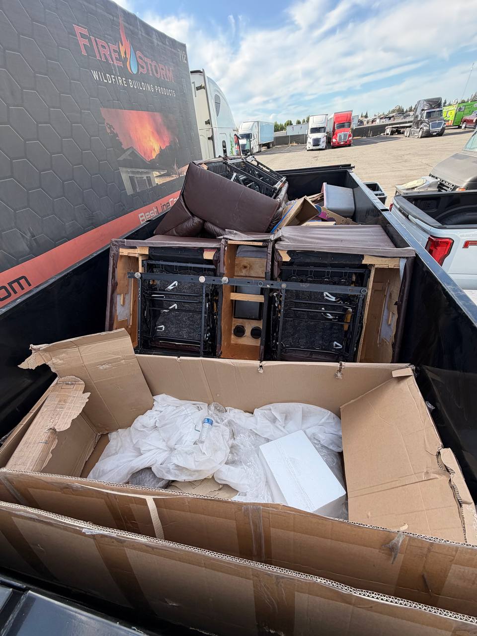 Disassembled recliners loaded during an estate cleanout